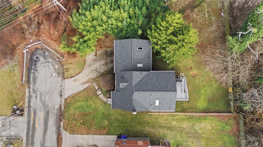 126 Leon Road Pittsburgh, PA 15220 - Photo 45 of 50 an aerial view of a house with a yard and large tree
