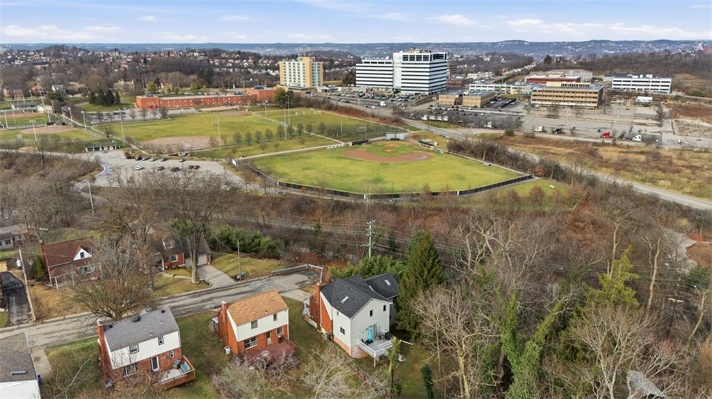 126 Leon Road Pittsburgh, PA 15220 - Photo 48 of 50 an aerial view of residential houses with outdoor space and swimming pool
