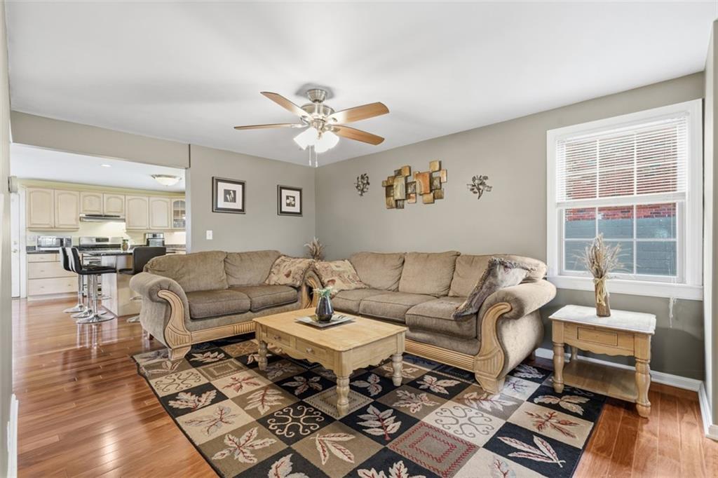 126 Leon Road Pittsburgh, PA 15220 - Photo 9 of 50 a living room with furniture and a window
