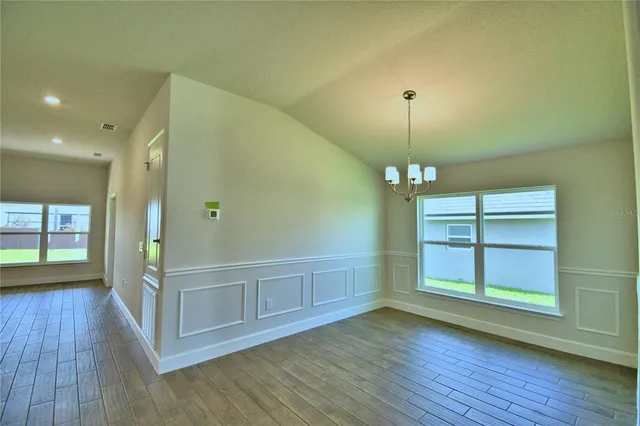 a bathroom with sink granite and mirror