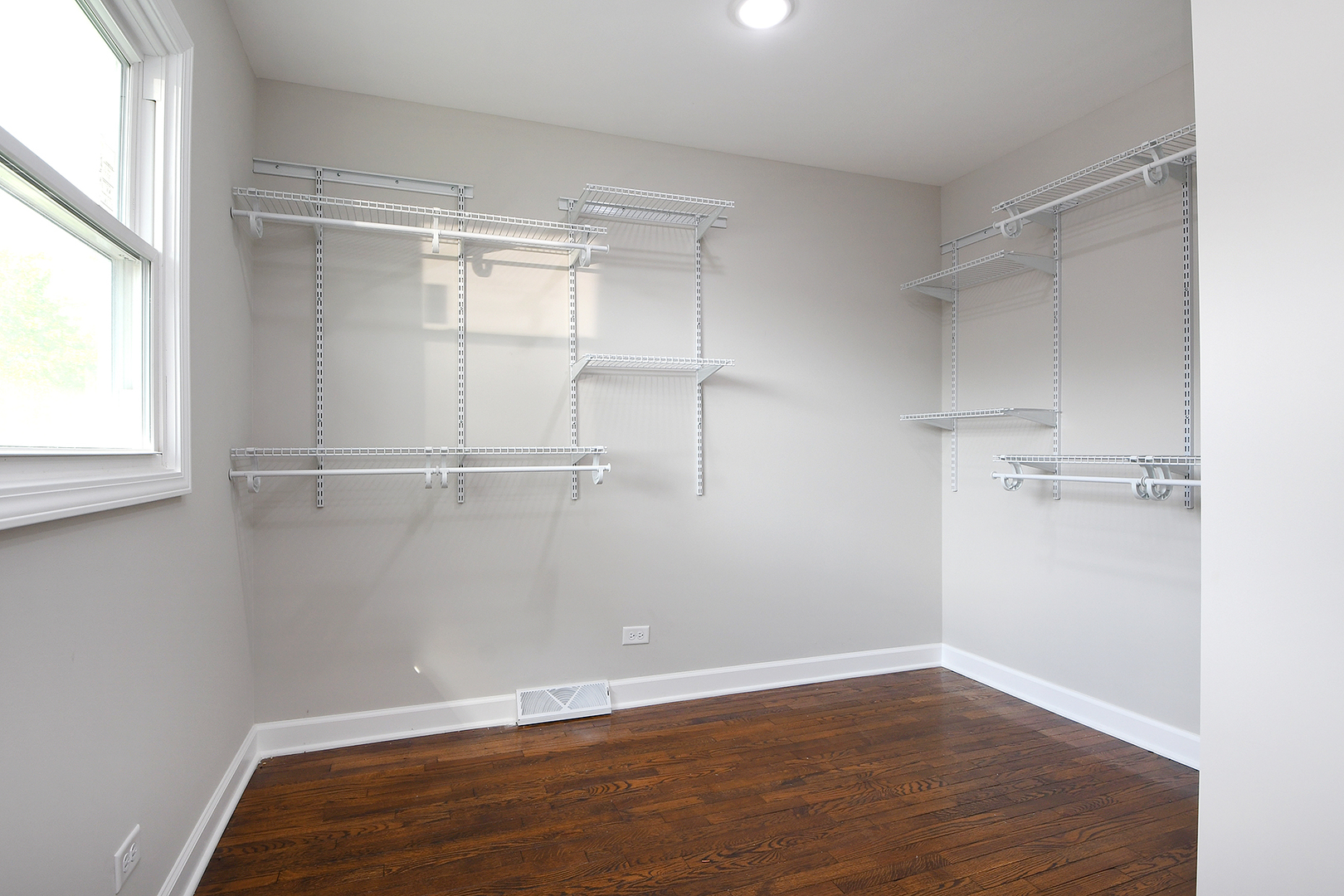 18938 Jonathan Lane Homewood, IL 60430 - Photo 17 of 33 a view of a room with wooden floor and a window