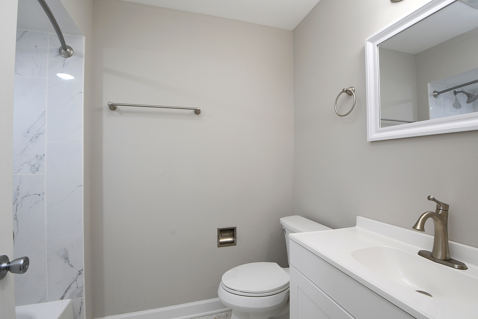 18938 Jonathan Lane Homewood, IL 60430 - Photo 20 of 33 a bathroom with a sink toilet and vanity