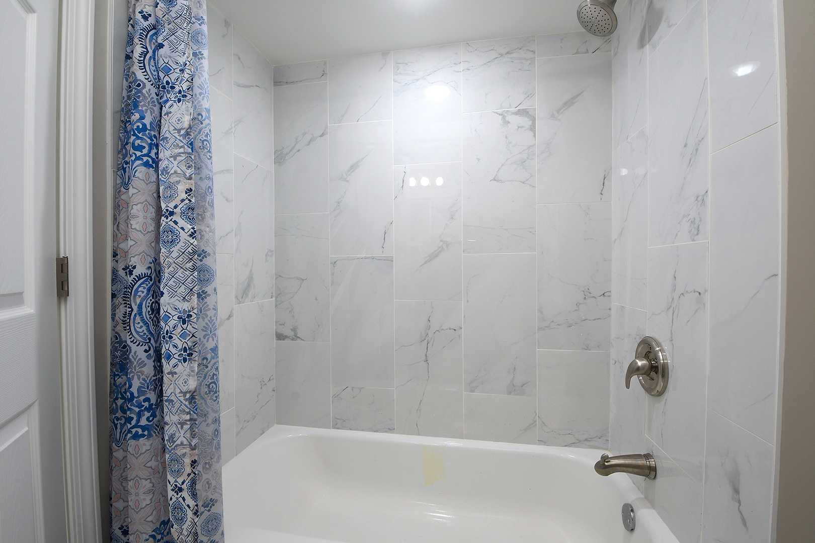 18938 Jonathan Lane Homewood, IL 60430 - Photo 21 of 33 a bathroom with a shower and a bathtub
