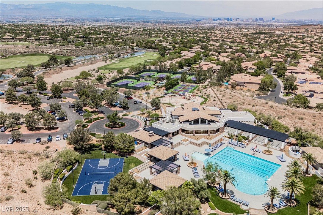 17 Caprington Road Henderson, NV 89052 - Photo 26 of 34 Aerial perspective of suburban area with a water and mountain view and a pool area