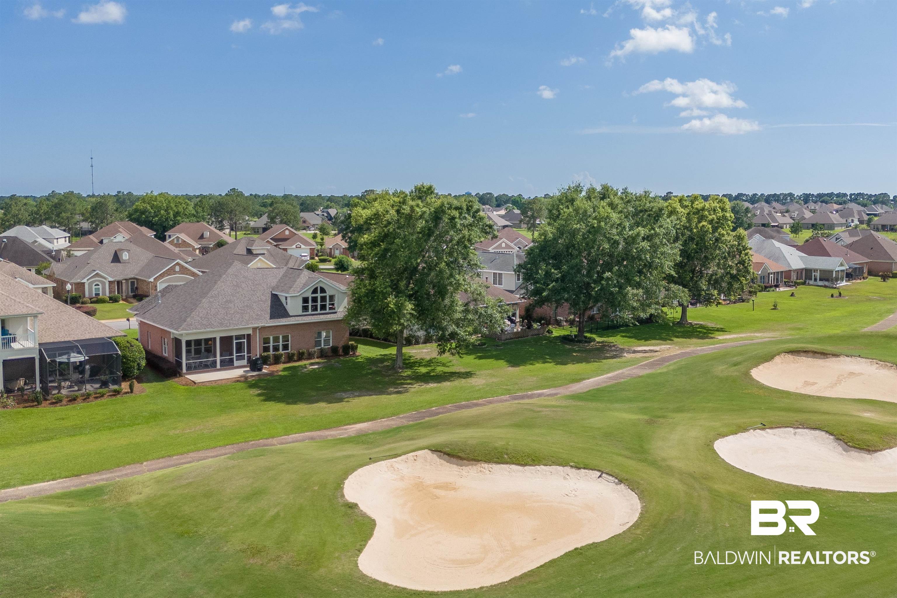 22739 Inverness Way Foley, AL 36535 - Photo 3 of 80 Aerial perspective of suburban area featuring a local golf course