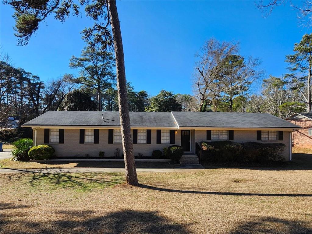 4427 Sun Valley Boulevard Atlanta, GA 30344 - Photo 1 of 1 a view of a house with a yard