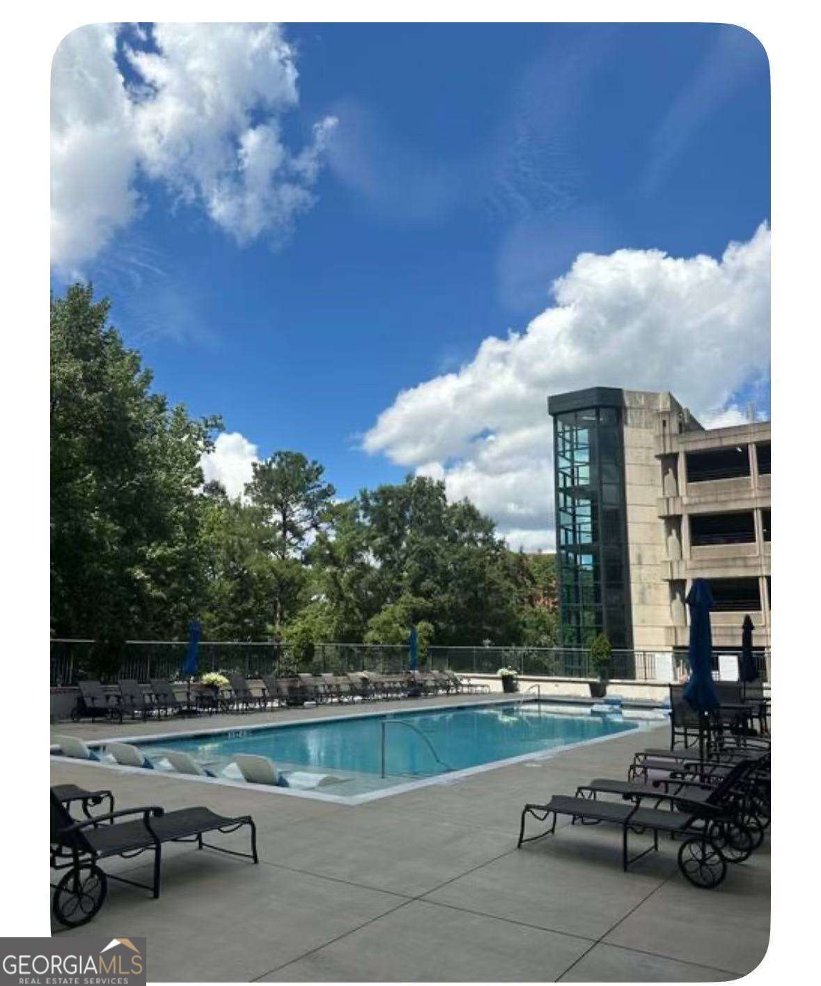 3040 Peachtree Road Northwest, Unit 1913 Atlanta, GA 30305 - Photo 10 of 12 a view of swimming pool from a balcony