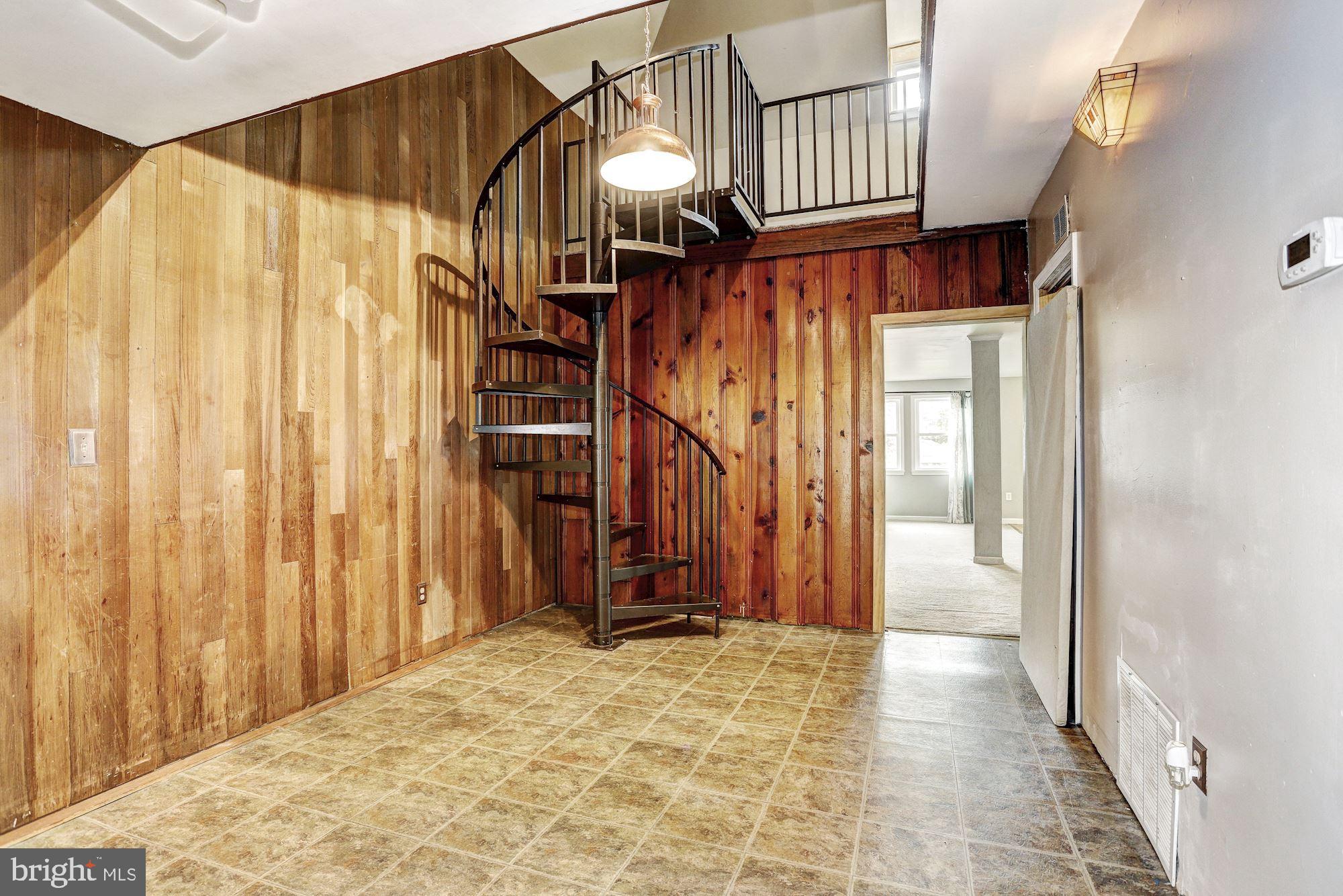1688 Grandview Road Pasadena, MD 21122 - Photo 5 of 23 Dining Room | Spiral Staircase