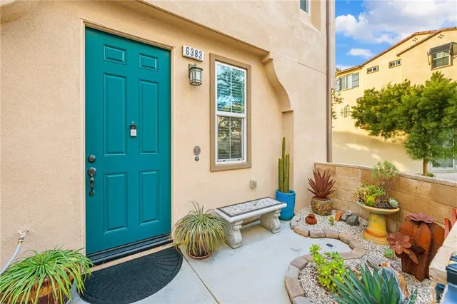 a view of a two chairs in the patio
