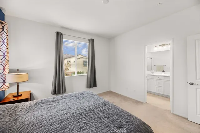 a bedroom with a bed and utility room