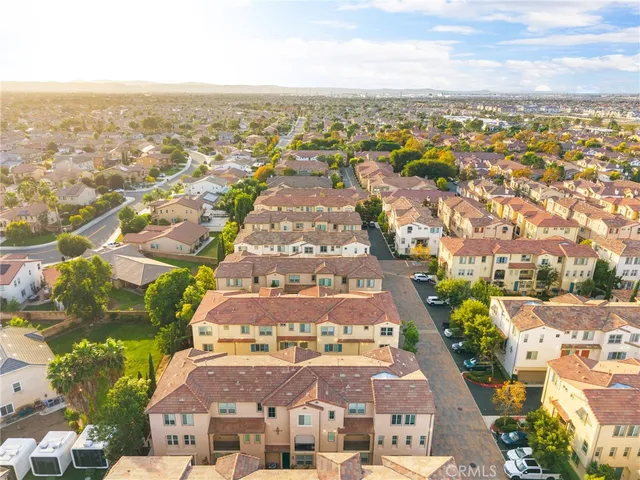 an aerial view of residential building with parking space