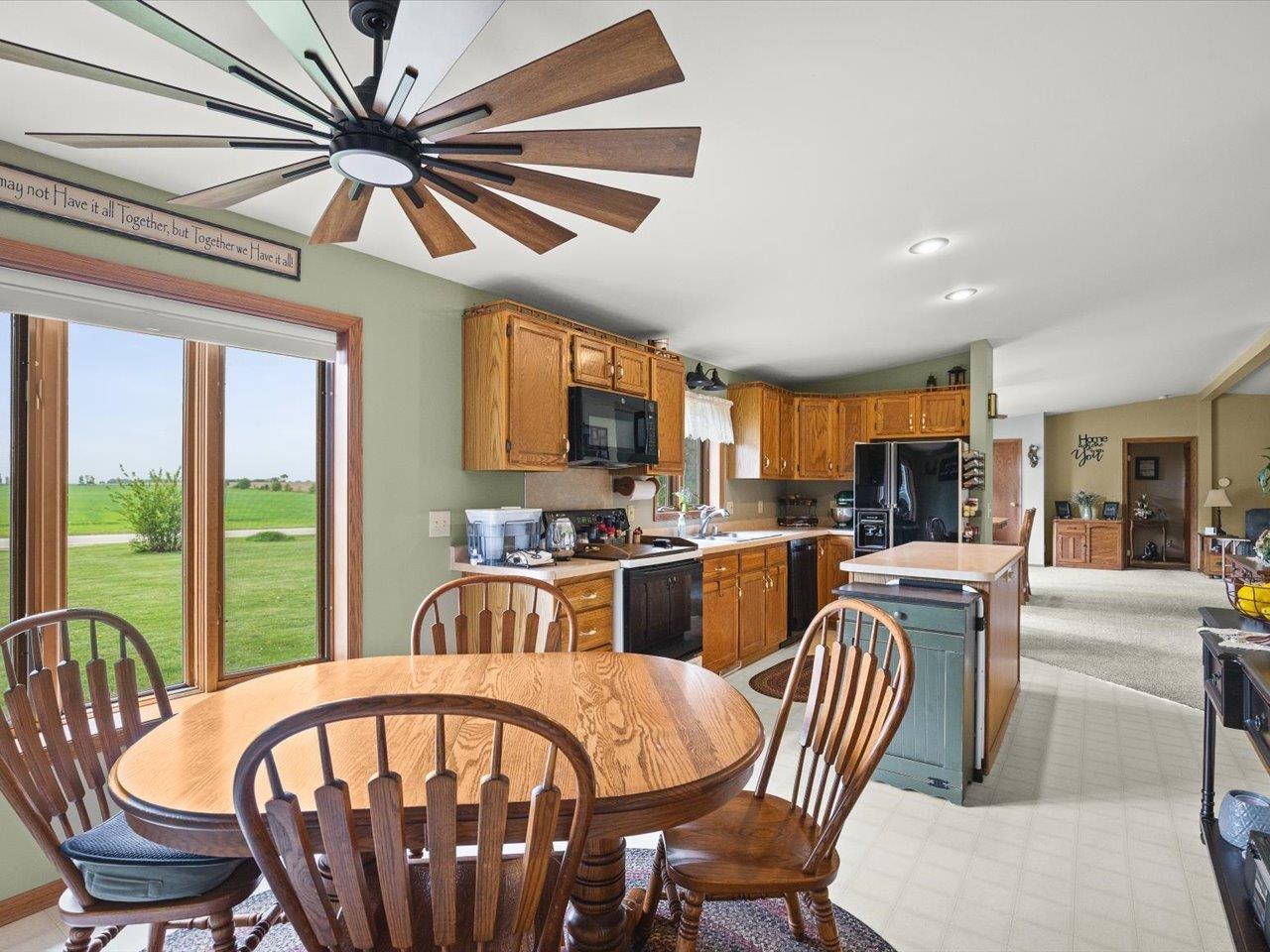 8500 Manchester Road Capron, IL 61012 - Photo 20 of 51 a view of a dining room with furniture window and outside view