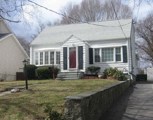 40 Broadmere Road Stratford, CT 06614 - Photo 1 of 1 a front view of a house with a yard