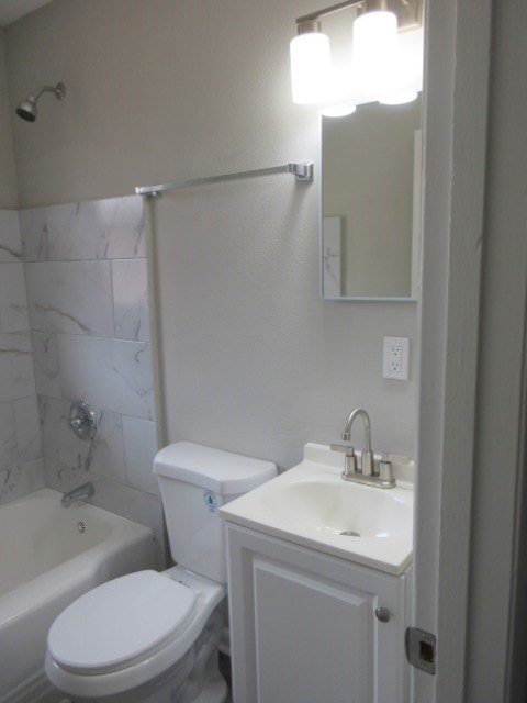 784 Terminal Court, Unit 10 Columbus, GA 31906 - Photo 15 of 26 a bathroom with a sink a toilet and shower