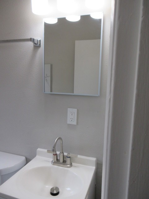 784 Terminal Court, Unit 10 Columbus, GA 31906 - Photo 19 of 26 a bathroom with a sink and a mirror