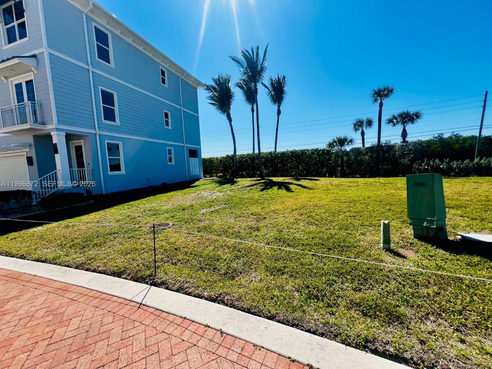 4803 Watersong Way Fort Pierce, FL 34949 - Photo 4 of 10 a view of a garden with an ocean
