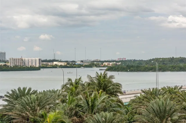 a living room with furniture and a white couch