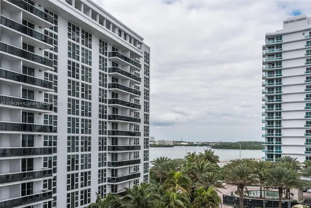 a view of a building with a yard