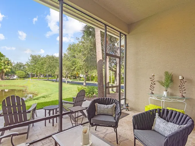 a view of a swimming pool with a garden