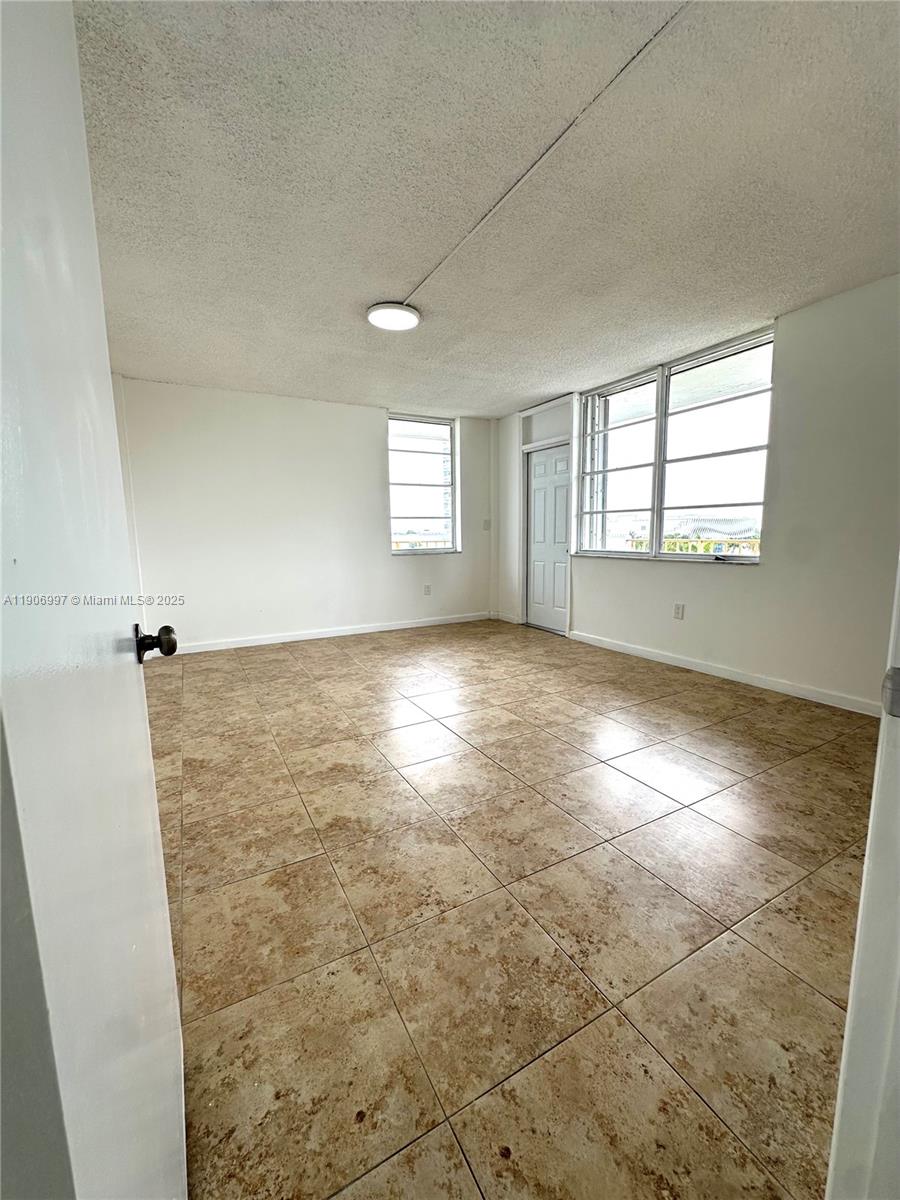 245 18th Street, Unit 801 Miami Beach, FL 33139 - Photo 5 of 11 a view of empty room with window