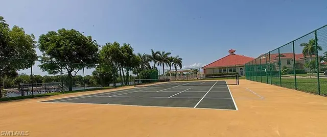 a view of outdoor space and tennis court