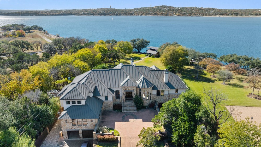 14423 Ridgetop Terrace Austin, TX 78732 - Photo 11 of 49 an aerial view of a house with a lake view