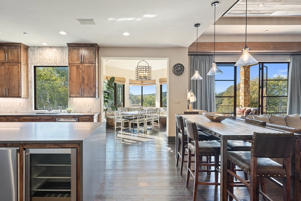 14423 Ridgetop Terrace Austin, TX 78732 - Photo 21 of 49 a view of a dining room with furniture window and outside view