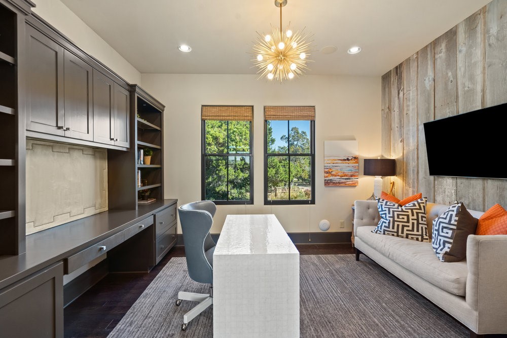 14423 Ridgetop Terrace Austin, TX 78732 - Photo 23 of 49 a living room with furniture fireplace and flat screen tv