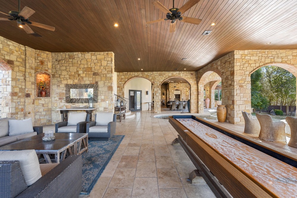 14423 Ridgetop Terrace Austin, TX 78732 - Photo 30 of 49 a living room with lots of furniture and a large window