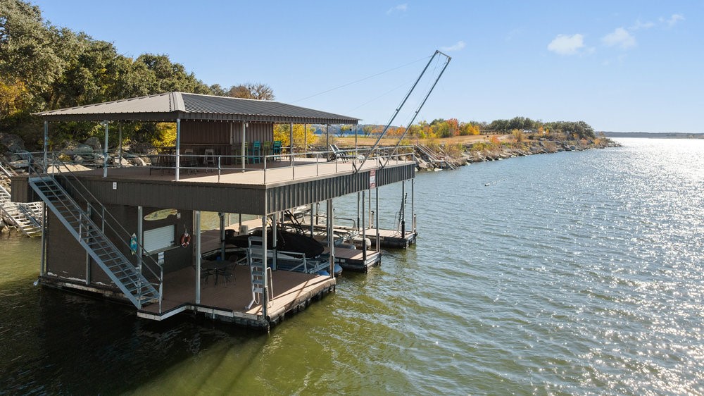 14423 Ridgetop Terrace Austin, TX 78732 - Photo 43 of 49 a view of a swimming pool with outdoor seating and a yard