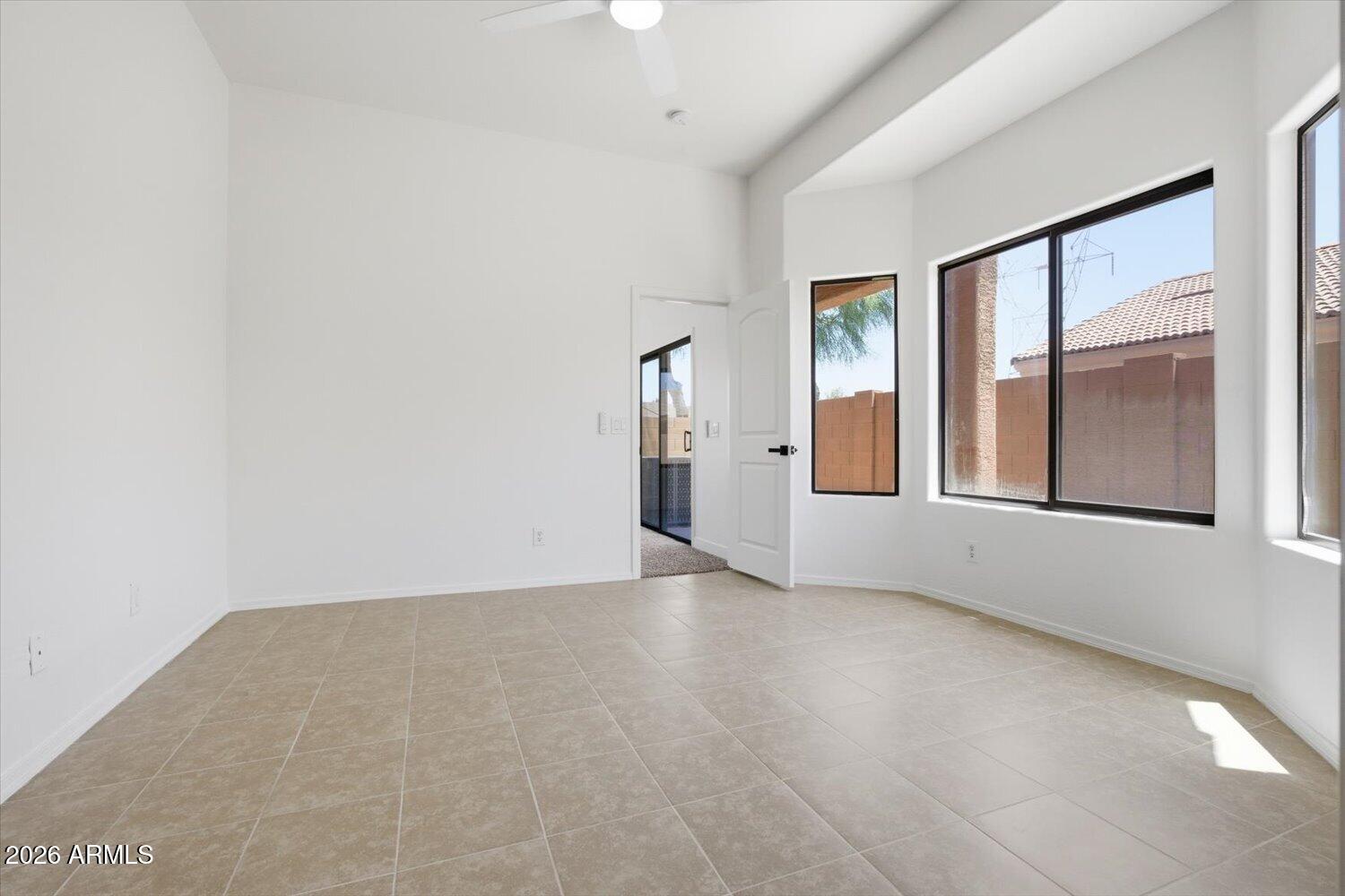 2565 South Signal Butte Road, Unit 23 Mesa, AZ 85209 - Photo 15 of 29 a view of an empty room with a window