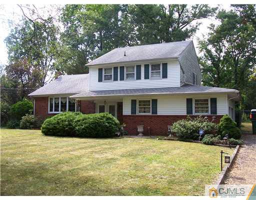 3 Ellmyer Road Edison, NJ 08820 - Photo 1 of 18 a front view of a house with a yard