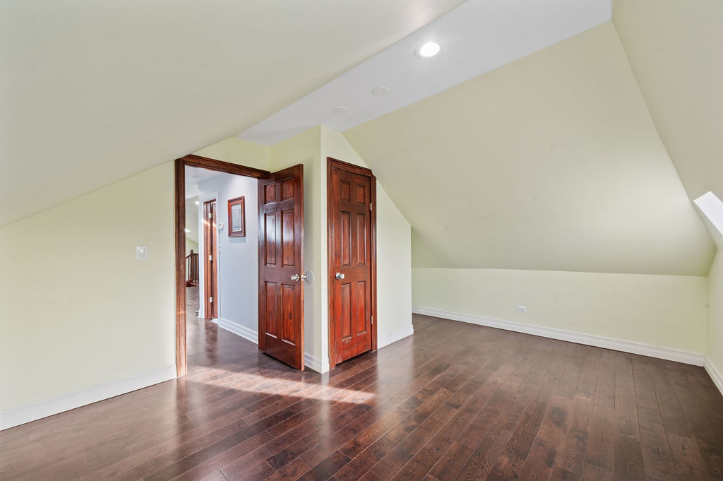 3100 West 39th Place Chicago, IL 60632 - Photo 30 of 36 a view of a hallway with wooden floor