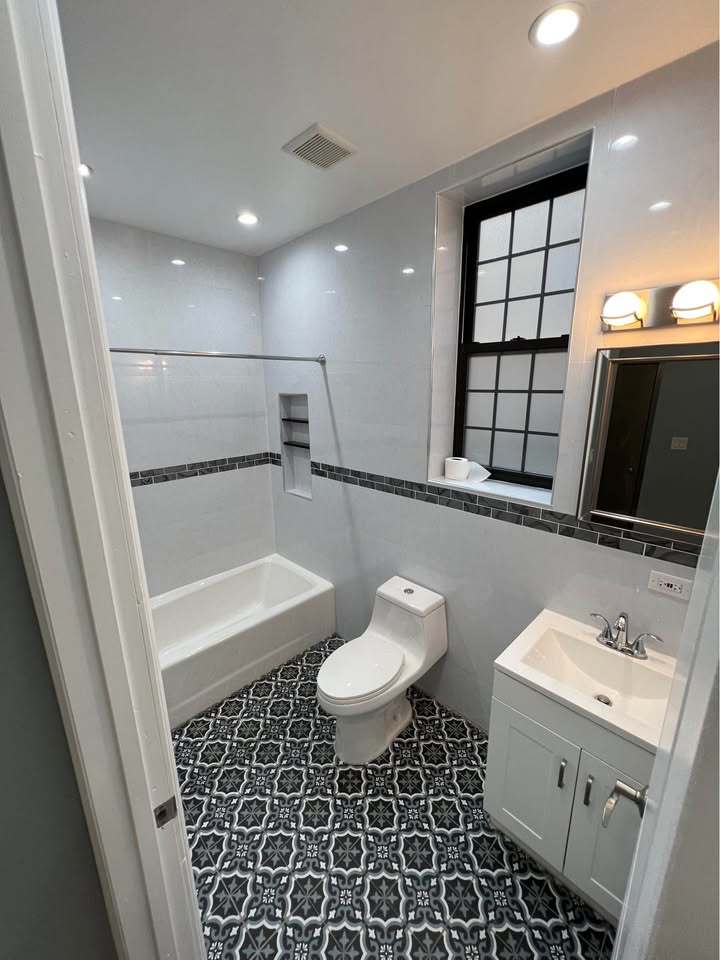 3100 West 39th Place Chicago, IL 60632 - Photo 34 of 36 a bathroom with a sink toilet and shower