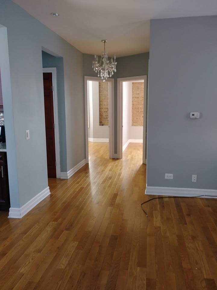 3100 West 39th Place Chicago, IL 60632 - Photo 36 of 36 a view of an empty room with wooden floor and a window