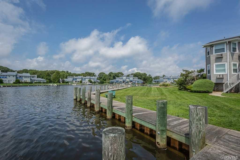 a view of a lake with a city from a lake view