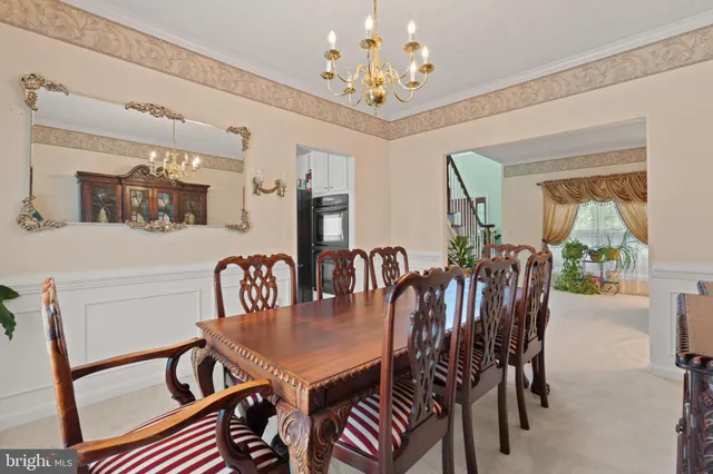a kitchen with a sink stove top oven and cabinets