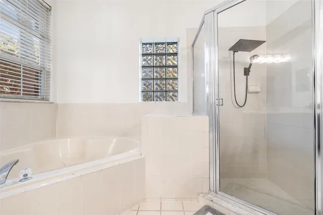 a bedroom with furniture and wooden floor