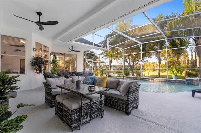 a view of a swimming pool with a patio