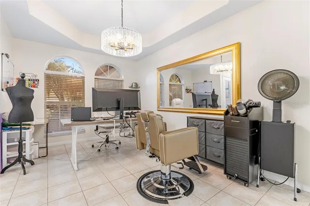 a view of a dining room with furniture window and outside view