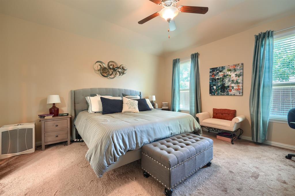 12417 Hitch Rack Way McKinney, TX 75071 - Photo 12 of 17 Carpeted bedroom featuring ceiling fan