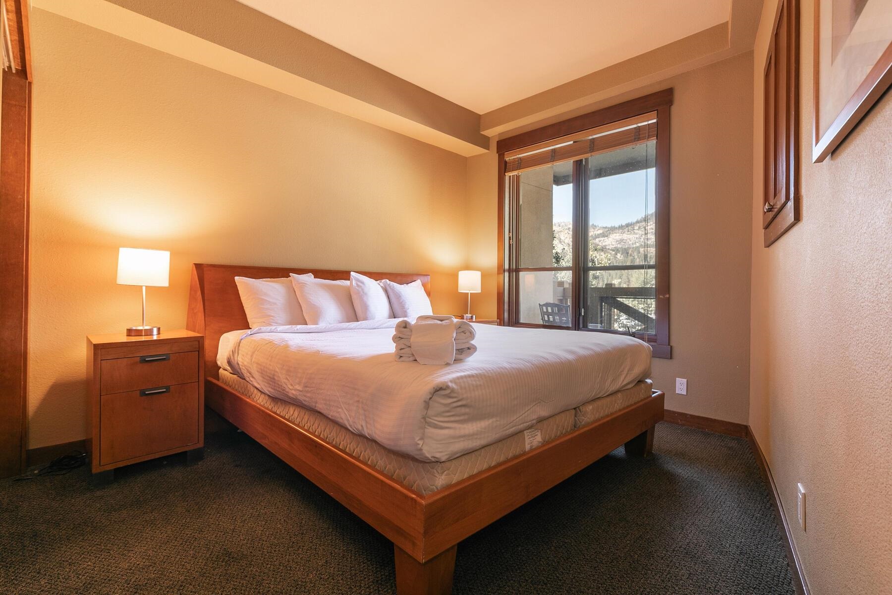1850 Village South Road, Unit 4227 Olympic Valley, CA 96146 - Photo 11 of 21 a bed sitting in a bedroom next to a window