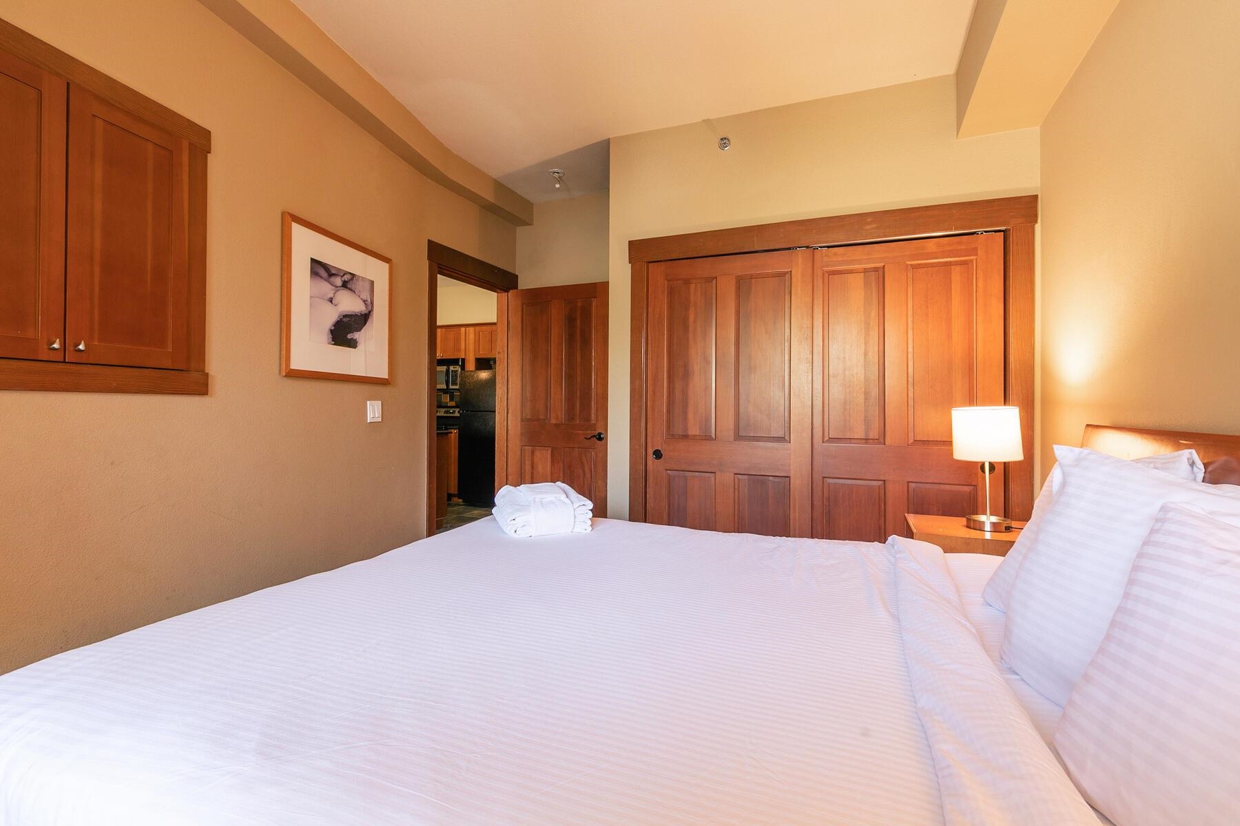 1850 Village South Road, Unit 4227 Olympic Valley, CA 96146 - Photo 12 of 21 a bedroom with a large bed and a window