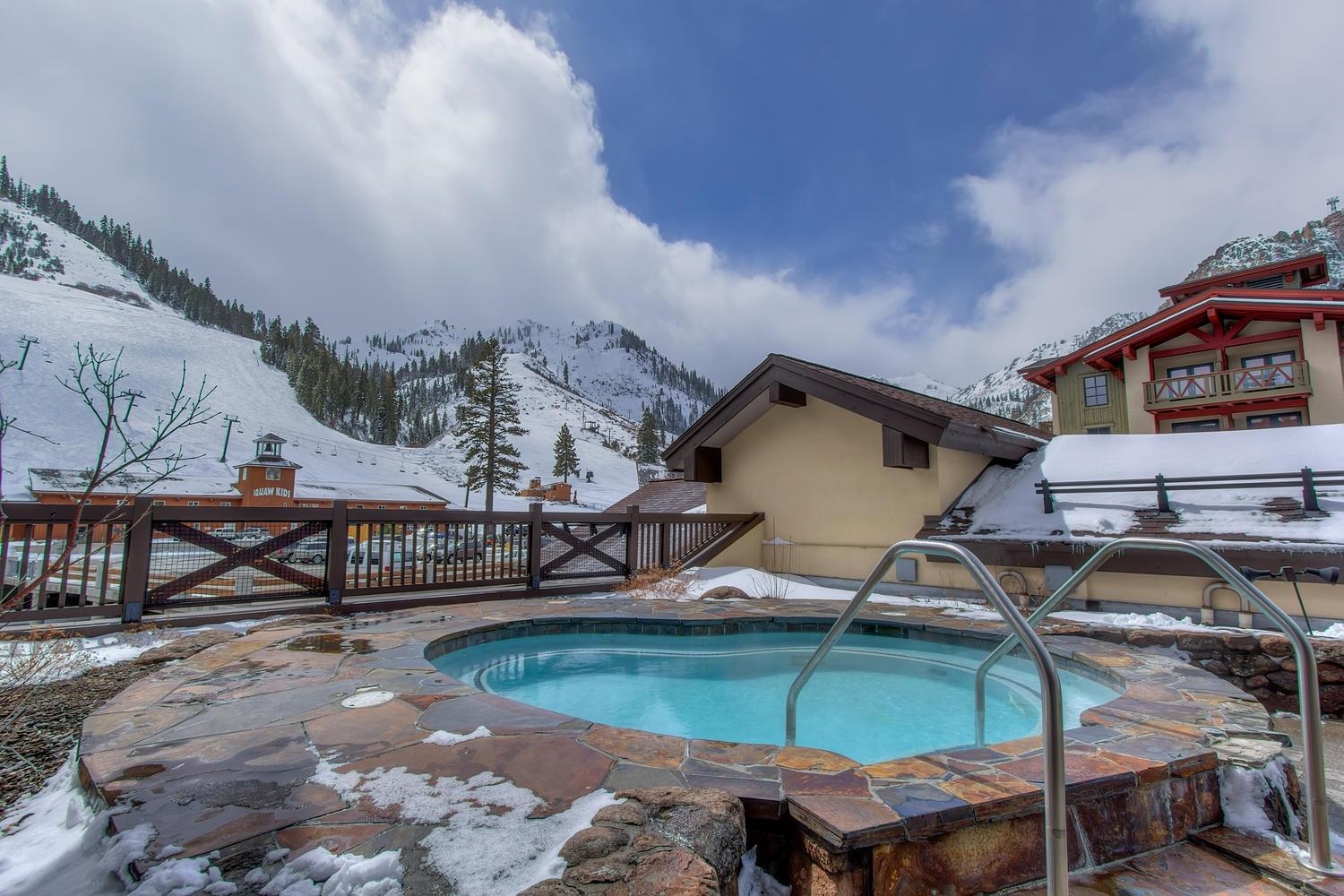 1850 Village South Road, Unit 4227 Olympic Valley, CA 96146 - Photo 16 of 21 a view of a house with pool and chairs