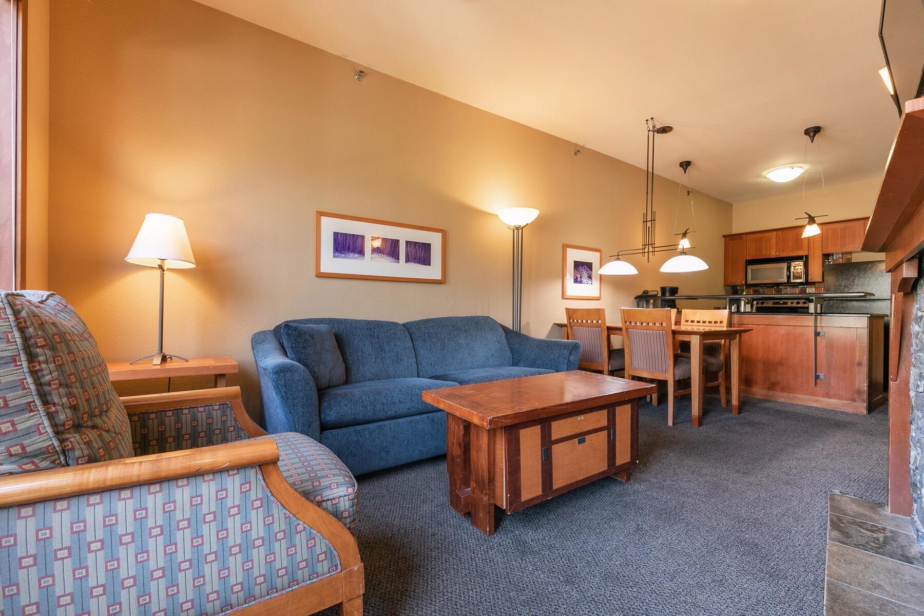 1850 Village South Road, Unit 4227 Olympic Valley, CA 96146 - Photo 5 of 21 a living room with furniture and a table