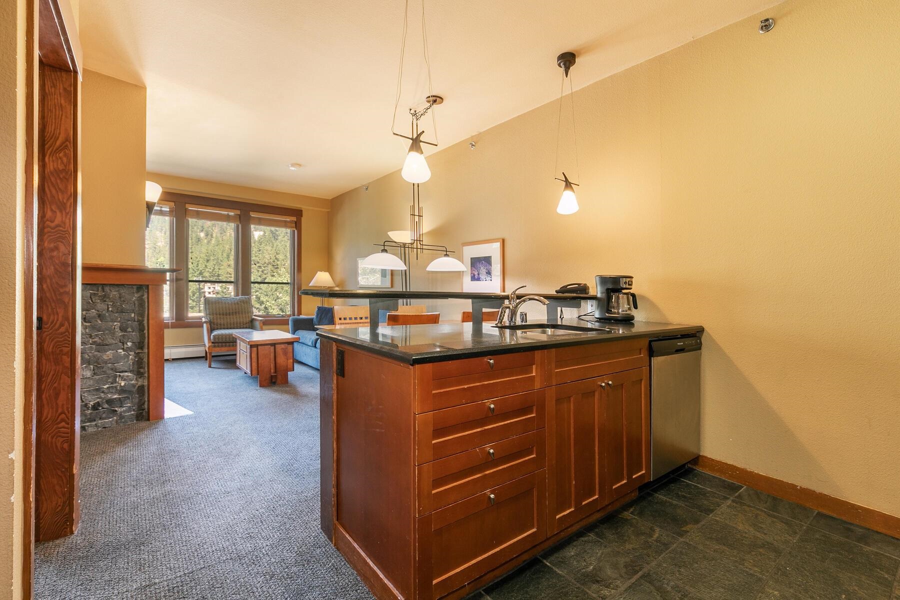1850 Village South Road, Unit 4227 Olympic Valley, CA 96146 - Photo 9 of 21 a kitchen with a sink and a large window