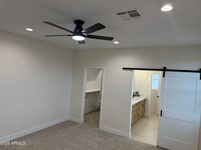 a bathroom with a double vanity sink mirror and a shower