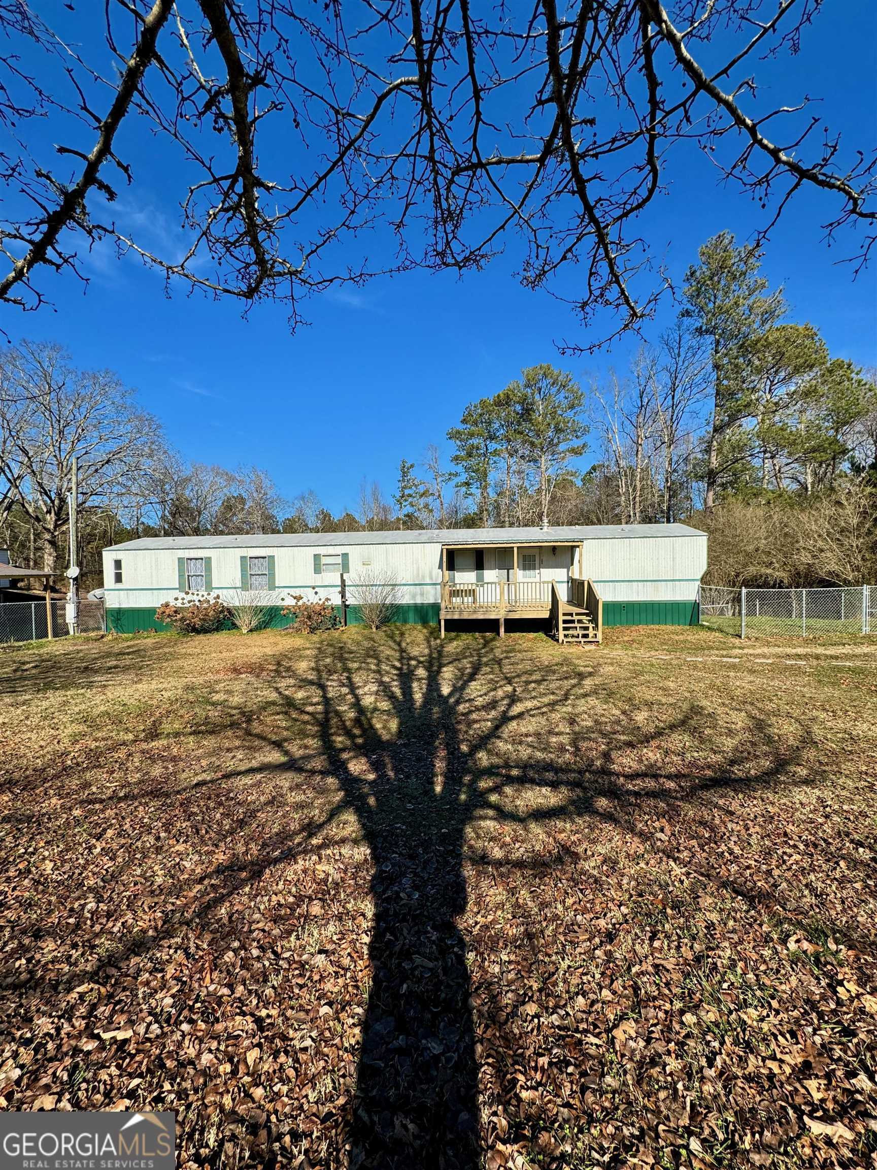 1201 Susie Pope Road Buchanan, GA 30113 - Photo 1 of 1 a view of a yard with an outdoor space
