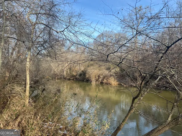a view of a backyard of the house