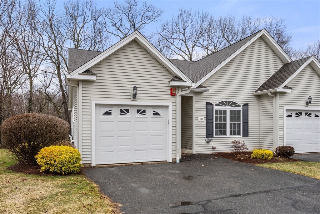 156 Canterbury Way, Unit 156 West Springfield, MA 01089 - Photo 1 of 32 a view of a small house with garage
